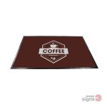 Feature floor mat showing coffee artwork